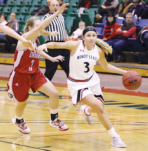 Sean Arbaut/Minot State athletics Minot State's Madison Wald (3) drives to the basket during a women's college basketball game on Friday.